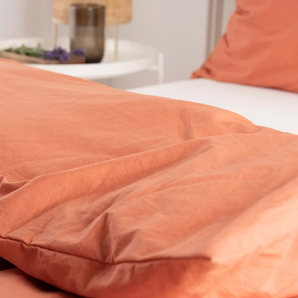 økologisk sengetøj i brændt orange